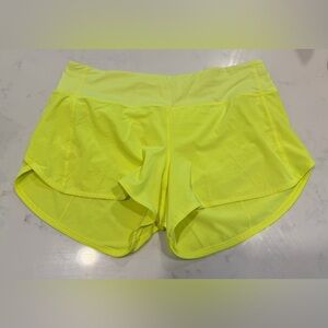 Lululemon Speed Up Mid-Rise 4” Lined Shorts in highlighter yellow